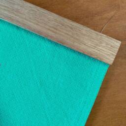 Cross - Hand Painted Wall Hanging in Aqua Blue & Red On Woven Cotton Fabric, With Tasmanian Oak Hanger - thumbnail 2