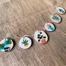 Handmade House Plant Garland - Rustic Wood Slice Wall Decor - thumbnail 1