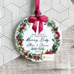 Personalised Christmas Family Names Bow Greenery Wreath Design Ceramic Round Ornament Keepsake
