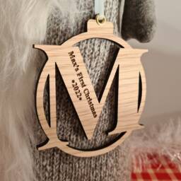 First Christmas Engraved Oak Letter Bauble Decoration - thumbnail 3