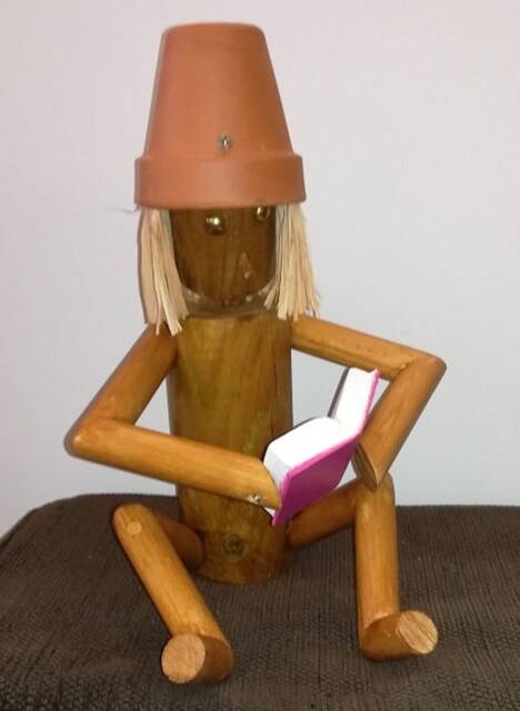 The Reader - Little Wooden Man