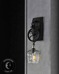Industrial Pulley Wheel Wall Sconce With Recycled Crown Royal Glass Bottle Lamp Shade & Vintage Style Edison Bulb