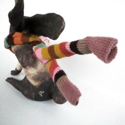 Ceramic Rabbit in The Wind With A Hand Knitted Striped Scarf - thumbnail 4