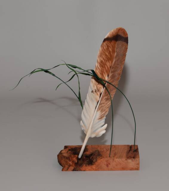 Hand-Carved Red Tail Hawk Feather Suspended By Canary Grass - image 1