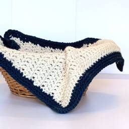 White Crochet Baby Blanket With Blue Border - thumbnail 1