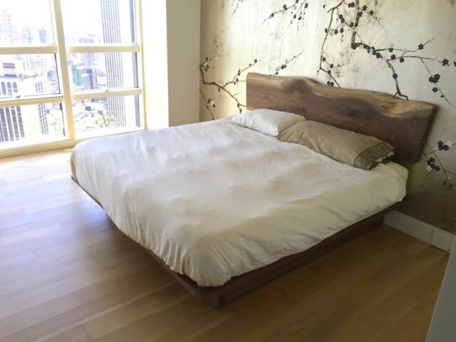 Platform Storage Bed With Live Edge Headboard - image 1