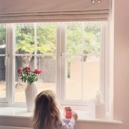 Pink Floral Bunnies Blackout Roman Blind With Pom Trim - thumbnail 3