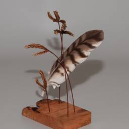 Hand-Carved Barred Owl Feather Suspended By Giant Blue Stem Grass - thumbnail 2