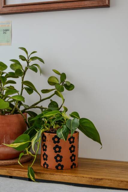 Handmade Concrete Planter - Tan With Black Daisy Pattern - image 1