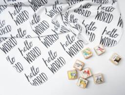 Hello World Organic Cotton Baby Blanket - Monochrome Swaddle