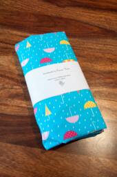 Colourful Umbrellas Handmade Fitted Cotton Cot Or Toddler Bed Sheet - thumbnail 1
