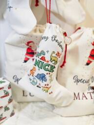 Personalised Christmas Special Delivery Stocking, Dinosaur Gifts, Family Stocking Set, Kids & Baby - thumbnail 1