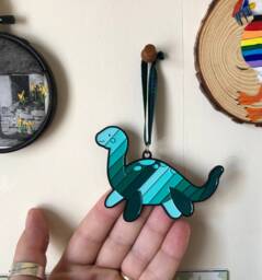 Enamel Nessie Ornament, Teal Loch Ness Monster With Tartan Ribbon - thumbnail 1