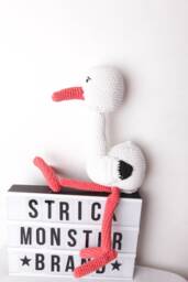 Crocheted Music Box Stork - thumbnail 1