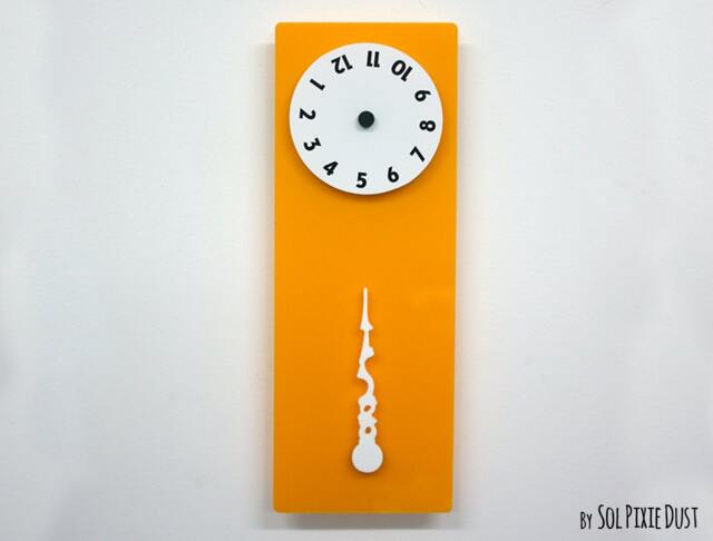 stable Hand, Rotating Numbers - Yellow Wall Clock - image 1