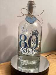Personalised 80Th Birthday Light Up Bottle, Bottle Lamp With Gift Messaging Service & Bag