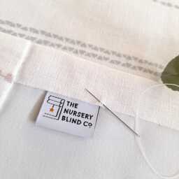 White Roman Blind With Multi Pom Trim & Blackout Lining - thumbnail 2