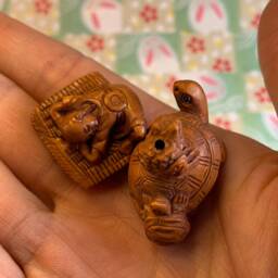 Hand Carved Boxwood Ojime Sleeping Baby & Turtle Family Charms - thumbnail 1