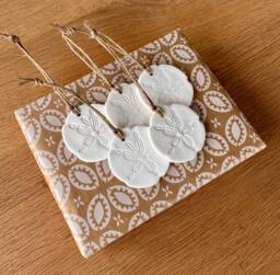 White Polymer Clay Sand Dollar Handmade Christmas Ornaments Coastal Gift Tags, Set Of 5 Small/3 Medium - thumbnail 1