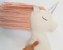 stuffed Unicorn Doll, Wool Yarn Mane, Embroidered Eyes Nursery Decor - thumbnail 1
