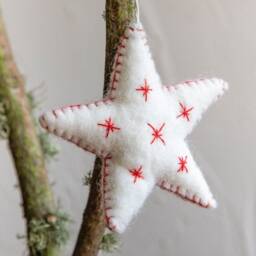 Handcrafted Wool Felt Star Ornament - White With Red Stitch Detail - thumbnail 1