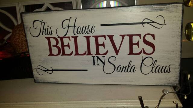 This House Believes in Santa Claus Distressed Wood Sign Rustic Primitive Wall Hanging Holiday Decor Christmas Decoration Believe - image 1