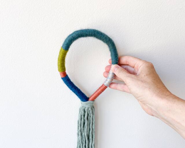 Knotted Rope Loop Wall Hanging, Tassel Wrapped Art, Minimalist Macrame Yarn Knot Design, Housewarming Gift - image 1