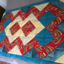 Bedspread Made With Triangles Sewn Drawing Geometrical Figures - thumbnail 2