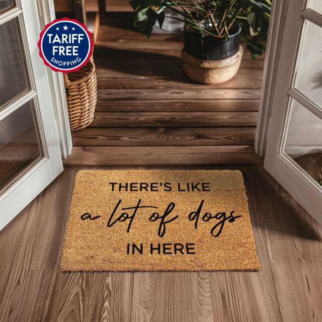 A Lot Of Dogs Live Here Doormat - Personalized Dog There's Like in Mat Funny Family Pet Door Lover Gift - image 1