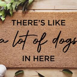 A Lot Of Dogs Live Here Doormat - Personalized Dog There's Like in Mat Funny Family Pet Door Lover Gift - thumbnail 3
