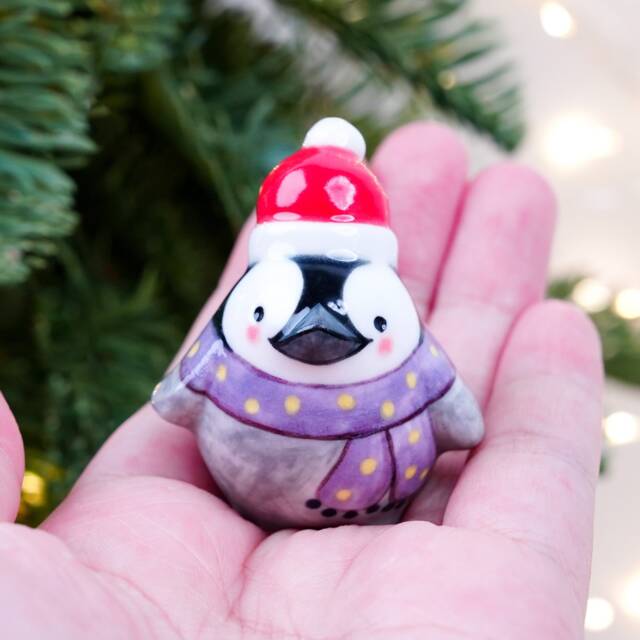 Hand-Painted Porcelain Penguin Figurine, Santa Hat Ornament - image 1