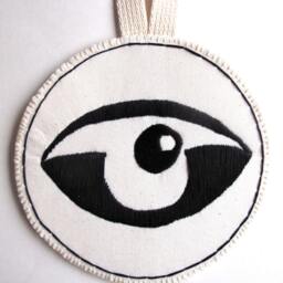 Textile Wall Hanging Hand Embroidered Abstract Eye On A Round Cream Muslin Long Canvas Loop - thumbnail 2