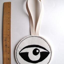 Textile Wall Hanging Hand Embroidered Abstract Eye On A Round Cream Muslin Long Canvas Loop - thumbnail 3