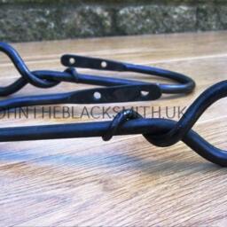 A Pair Of Wrought Iron Curtain Holdbacks With Forged Mouse Tail Finial Ends - thumbnail 3