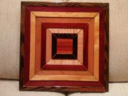 Wood Wall Art Sculpture Featuring A Variety Of Exotic Wood Pieces in Geometric Array - thumbnail 1