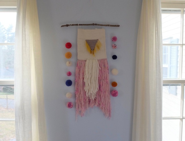 Woven Wall Hanging With Pom Sashes