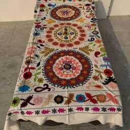Hand-Embroidered Cotton Suzani Quilt - Vibrant Bohemian Folk Textile, Reversible Throw Blanket - thumbnail 2