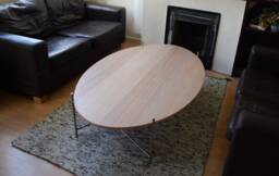 Hand-Crafted Oval Coffee Table With Rustic Metal Legs - thumbnail 1