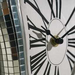 Melting Mirror Clock - Silver Roman Wall Clock, Surrealist Home Decor, Modern Bookshelf Accent - thumbnail 3