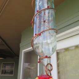 Hand Wrapped Copper Wire Wine Bottle Hummingbird Feeder With Large Charm & Red Beads - thumbnail 3