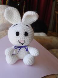 Bunny Rabbit Crocheted in White 8 Ply Acrylic Yarn With Purple Ribbon
