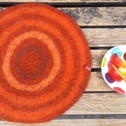 Handfelted Seat Cushion With Coloured Pattern Mix On Orange - thumbnail 2