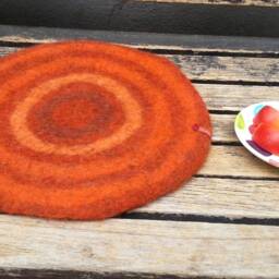 Handfelted Seat Cushion With Coloured Pattern Mix On Orange - thumbnail 3