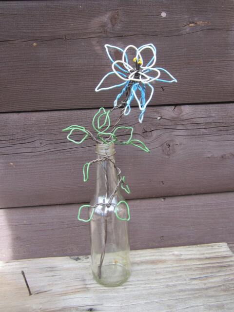 Columbine Flower Twisted Wire in A Glass Bottle - image 1