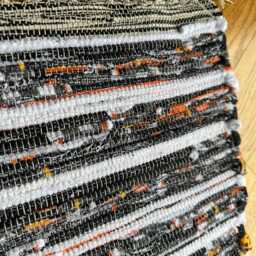 "Black, White & Orange Rug, 46 1/2"" L X 26" - thumbnail 2