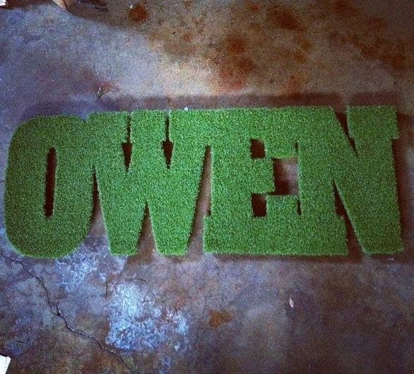 Customizable Name Synthetic Grass Rug - image 1