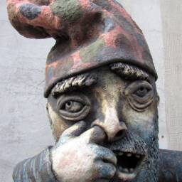Ceramic Garden Gnome With A Hand Carved Wood Shovel - thumbnail 2
