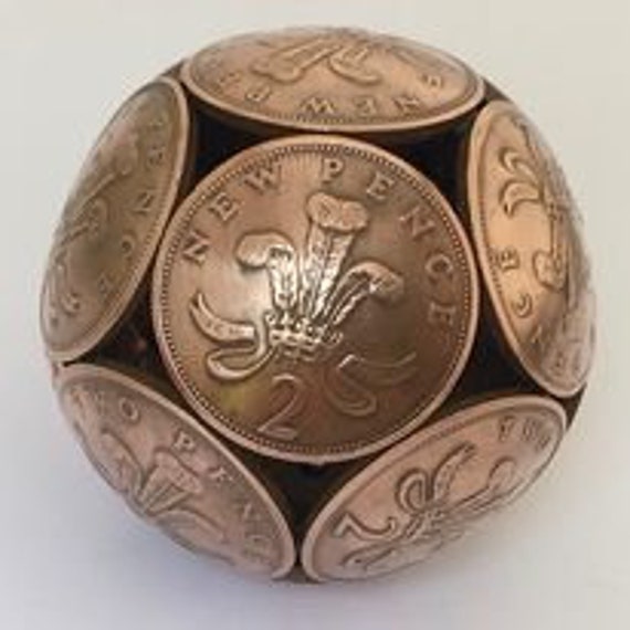British Bronze 1P Or 2P Coin Ball - image 1