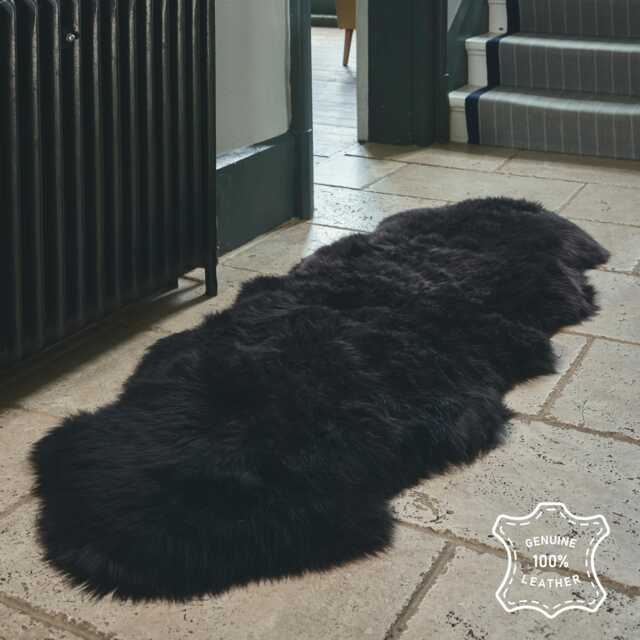 Jet Black Sheepskin Rug Silky Soft New Zealand Hide - 125cm X 65cm - image 1