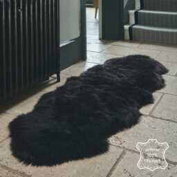 Jet Black Sheepskin Rug Silky Soft New Zealand Hide - 125cm X 65cm - thumbnail 1